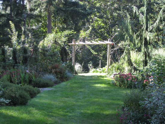 the new rose arbor - also leading to the garden below